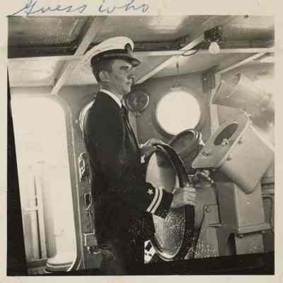 Frank Manson at the Helm