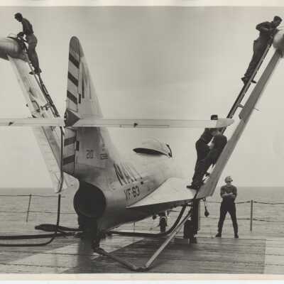 Refueling a F9F Panther on the Flight Deck of the USS Yorktown (CVA-10)