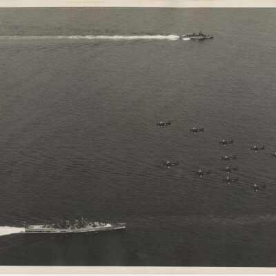 Skyraiders Flying Over Part of a Carrier Task Force