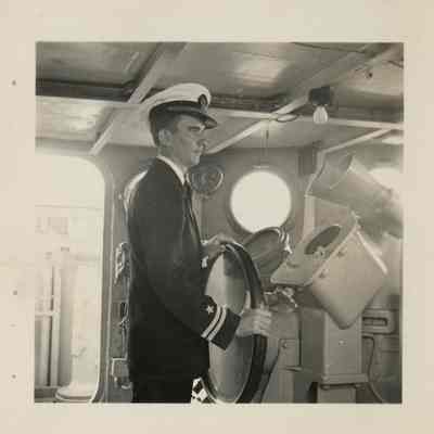 Frank Manson at the helm of the USS Laffey.