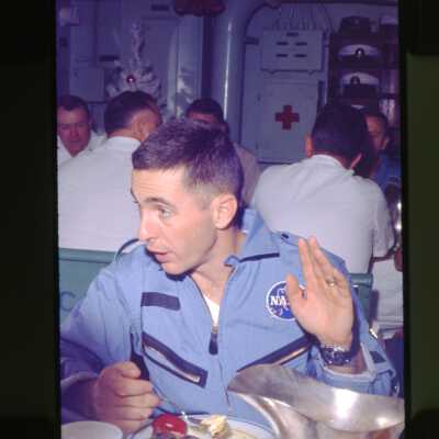 Astronaut William Anders Enjoys a Meal Aboard The USS Yorktown (CVS-10)