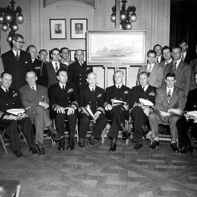 An Oil Painting of the USS Yorktown (CV-10) Being Presented to the Naval Academy