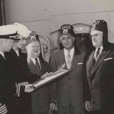 The Shriners Present the USS Yorktown (CVA-10) a Plaque