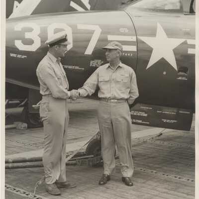 Captain Arnold McKechnie Congratulates H. J. Hunter
