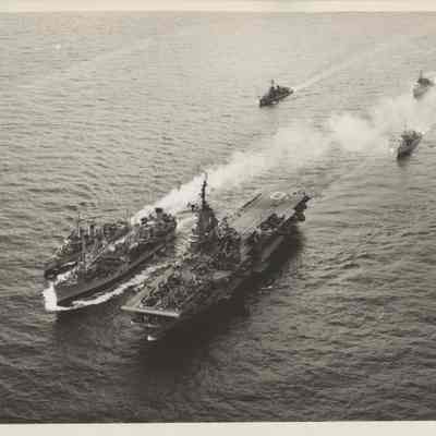USS Yorktown (CVA-10) and USS Daly (DD-519) Being Refueled by a Supply Ship