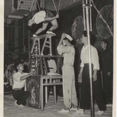 The Flying Tiger Troupe Astounds the Crew