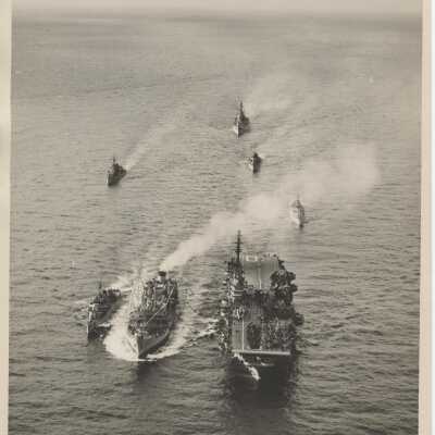 USS Yorktown (CVA-10) and USS Daly (DD-519) Being Refueled by a Supply Ship