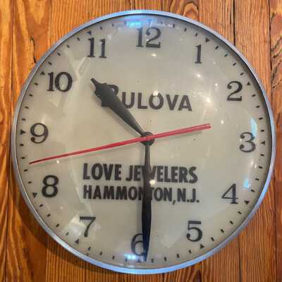 Bullova Clock (lighted) advertising Love Jewelers