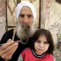 "Palestinian Man Holds the Key to the Home..." (2015)