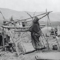          Woman weaving near Lake Huleh (circa 1920s); (original image)
   