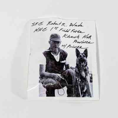Photograph of SFC Robert R. Wade with Military Dog, “Prince”