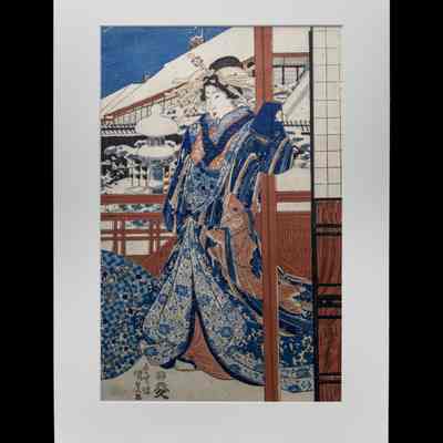 Woman Standing in Front of a Snow Covered Background