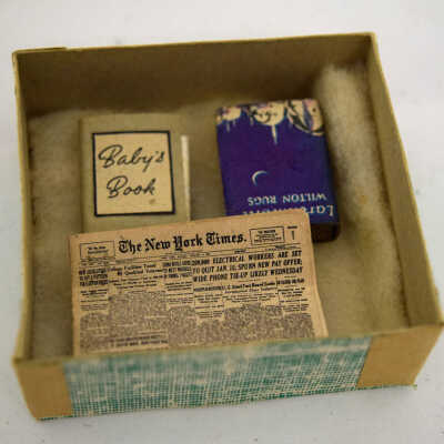 Miniature:Newspaper and books