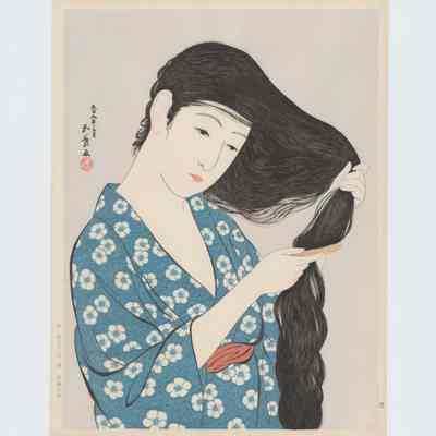 Woman Combing Hair