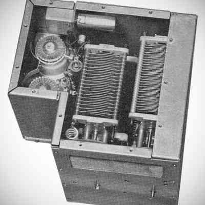 Amplifier compartment. Note pair of 4X150A tubes at upper left. View from front.: Image: CQ, Jan 1955