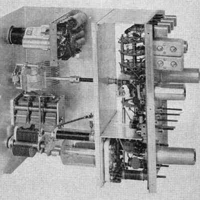 Right side assembly showing band-pass filters, crystal oscullator and second mixer, linear amplifier, pi-filter linear amplifier, and linearity-modulation monitor scope.: Image: CQ, Jun 1955
