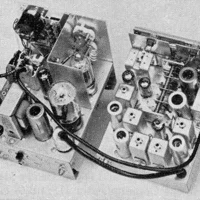 Transmitter and receiver sub-assemblies. The transmitter is at left. Power supply chassis not shown.: Image: QST, Jul 1962