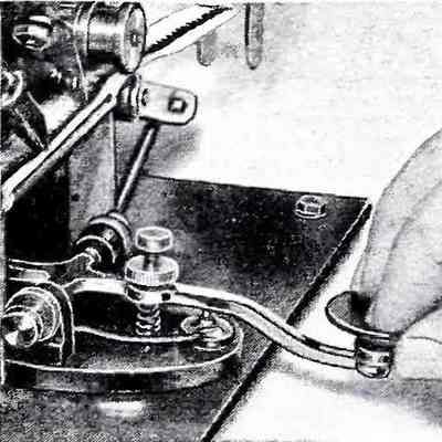 Figure 4. Incidental photo from and article on learning the Morse code showing the key and a small corner of the machine.: Image: Shortwave Craft, Nov 1932