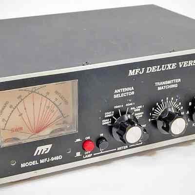 MFJ-949D. The power switch is now red, and meter switches for hi-low and peak-avg have been added to the front panel.