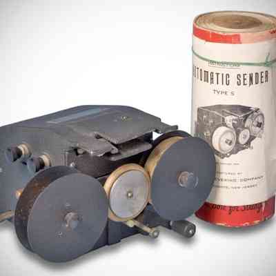 Image: Joe Veras, K9OCO: Shown with a cylinder of ten tapes that came with the machine. Additional tapes were available for 50 cents each.