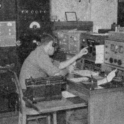 W1AW Maxim Memorial Station, 1956. Equipment in use includes (light gray piece in rack at left) Barker & WIlliamson L-1000A linear amplifier, and on the desk (from left), Barker & Williamson 5100 transmitter, Barker & Williamson 51SB sideband adapter, Collins 75A-4 receiver, and Hammarlund HQ-140 receiver.: Image from CQ magazine, Dec 1956