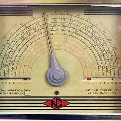 Dial detail. Note markers for bandspread (red) and band (black) below each end of dial scale.: image: hamandhifi.com