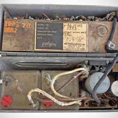 Note twin lead-acid batteries (lower left) and nameplate indicating model (HT-21), serial number (3273), frequency (53.73 MHz) and date of manufacture (6-17-1953). Battery electrolyte could be replenished by unscrewing the red plugs.: Image: Chuck Penson, WA7ZZE / Collection: westvalleyhamshack.com