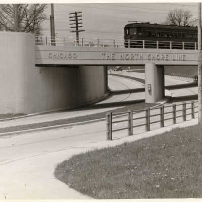 Trolley going over Sheridan Road viaduct