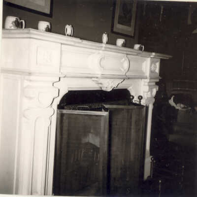 Fireplace with white mantel in Quinlan home