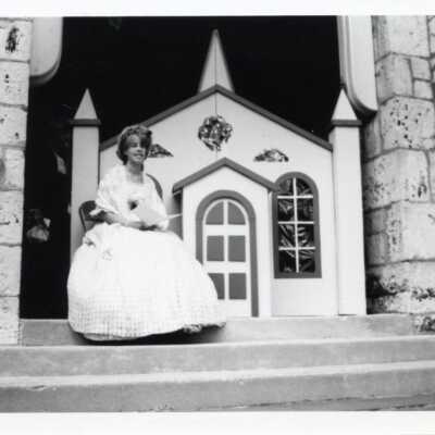 Margot Morrison and a replica of church