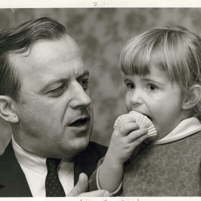 Dr. Molenda Watches As Young Girl Eats Cupcake