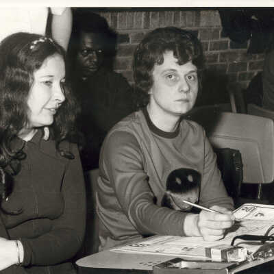 Two Women at Desk
