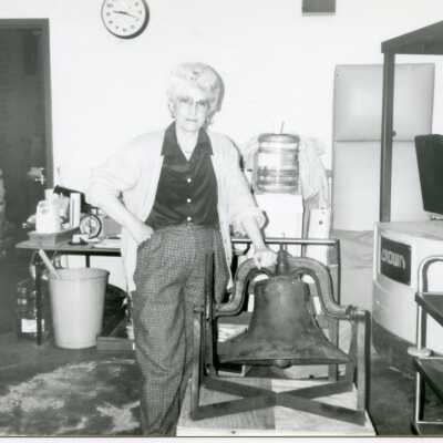 Shirley Paddock with the Everett School bell