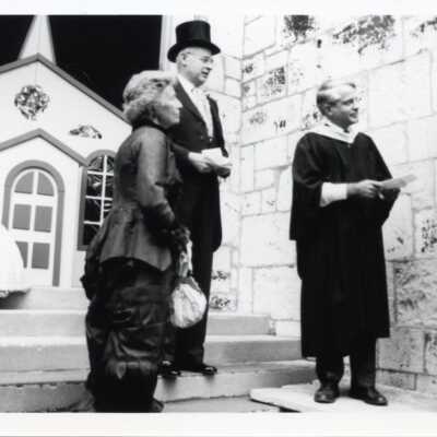 Margot Morrison and replica of old church