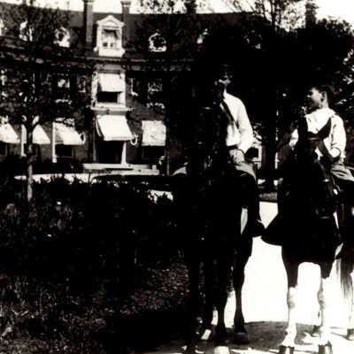 Two boys on horseback