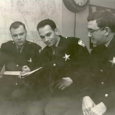 Three police officers