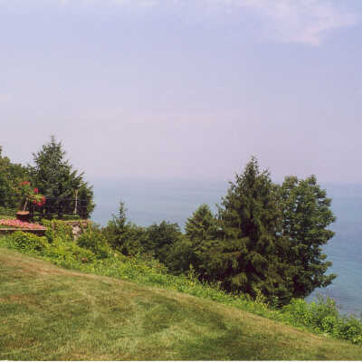 View of the sloping end of the lawn and Lake Michigan at the Edward Byron Smith house