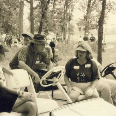 Two Women in Golf Carts