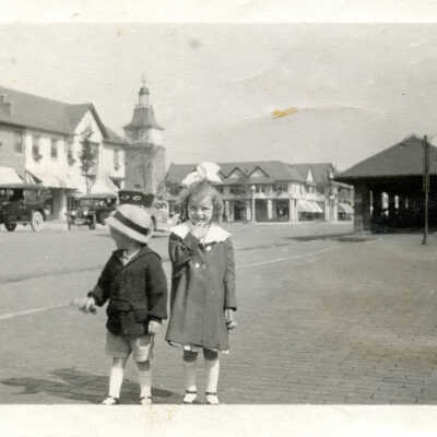Two children at train station