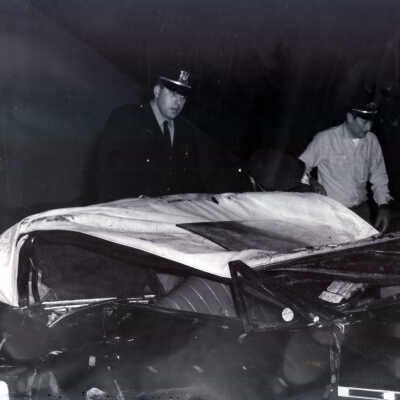 Police officers at car crash