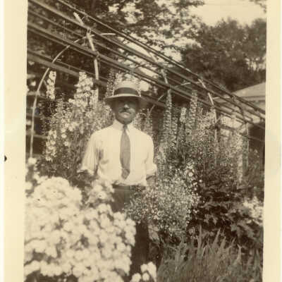 Man Standing in Garden