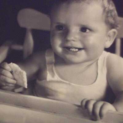 Portrait of toddler in high chair