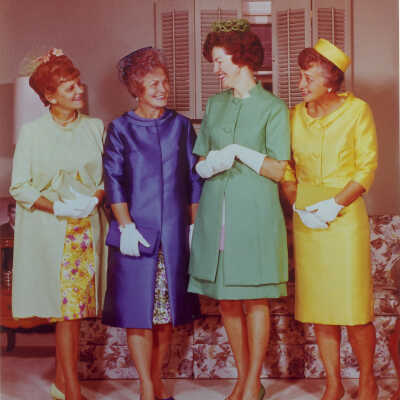 Four women modeling wedding attire