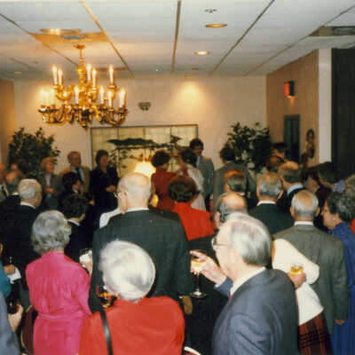 A group of unidentified people toasting