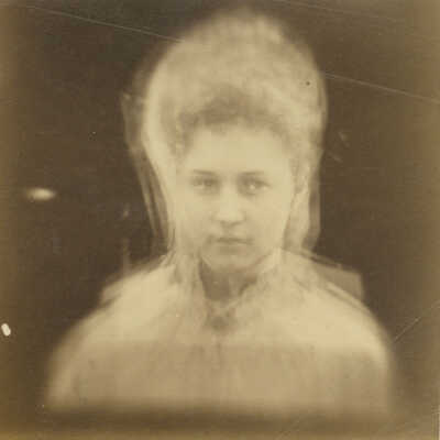 Young woman with lace head-covering