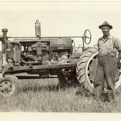 William Sneddon in front of a tractor