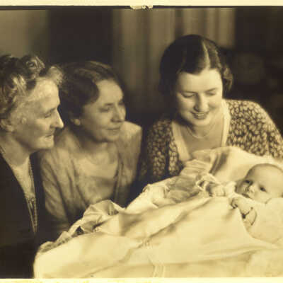 Three women with baby