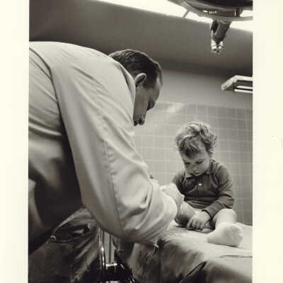 Dr. Apfelbach Examining Toddler
