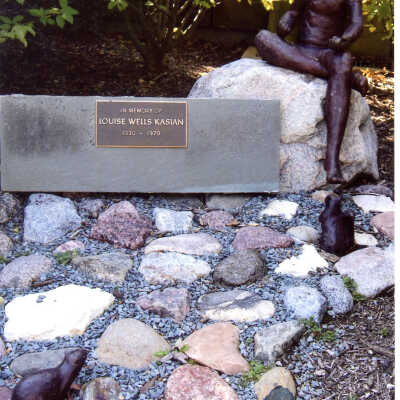Girl with a squirrel statue at Lake Forest Library