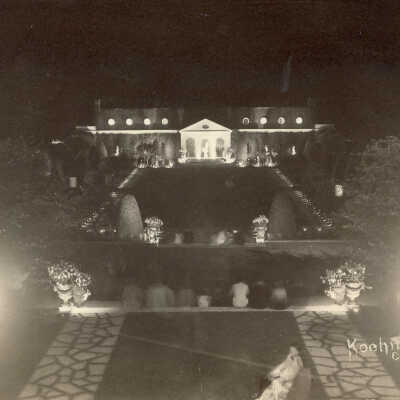 "Fairlawn" garden and lawn at night with stone walkway